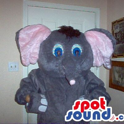 Soft brown-furred cow spotsound Mascot Costume with tail and beautiful shiny eyes .