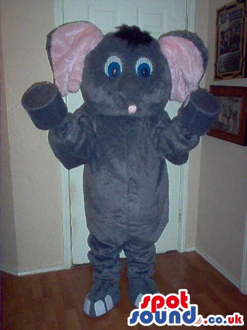 The Bull spotsound Mascot Costume in a grey suit with a black hooves and tail .