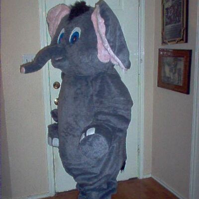 The Bull spotsound Mascot Costume in a brown suit with a black hooves .