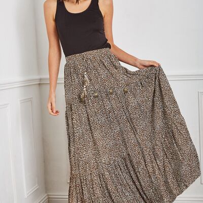 Long brown leopard-print skirt, vaporous tightening with cord adorned with bells.