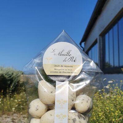 Nougatine seagull eggs with honey and white chocolates