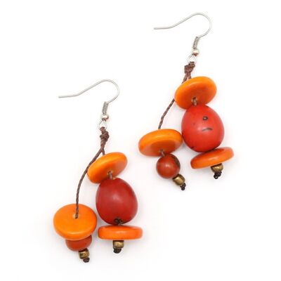 Aretes colgantes hechos a mano con disco y nuez de tagua color naranja oscuro