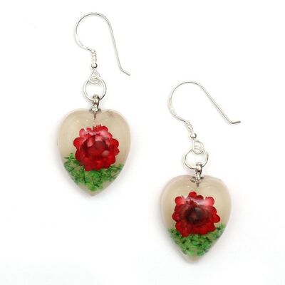 Boucles d'oreilles pendantes fleur pressée rouge en résine coeur blanc