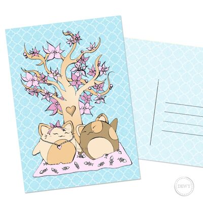 Cartolina A6 con albero in fiore di Sakura e gatti portafortuna