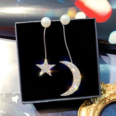 orecchini asimmetrici con la luna e le stelle