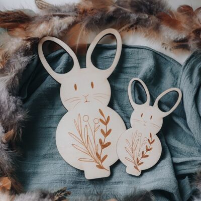 Duo of wooden Easter bunnies to pose