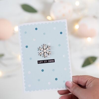 Cartolina di Natale con fiocchi di neve