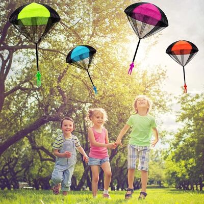 Hand throwing soldiers parachute toys children outdoor games