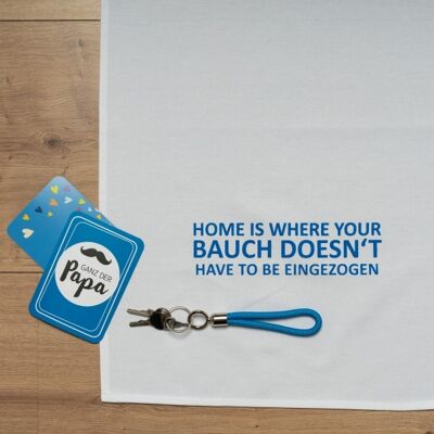 White tea towel, HOME IS WHERE YOUR BAUCH DOESN'T HAVE TO BE COLLECTED, blue