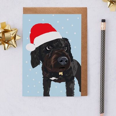 Cartolina di Natale Cockapoo nero in cappello di Babbo Natale