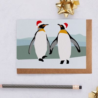 Weihnachtskarte Pinguine in Weihnachtsmützen