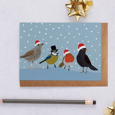 Weihnachtskarte Singvögel in Weihnachtsmützen mit Schnee