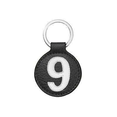 Leather key ring number 9 white black background 5 cm