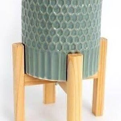 Grande fioriera in ceramica color verde acqua su supporto in legno