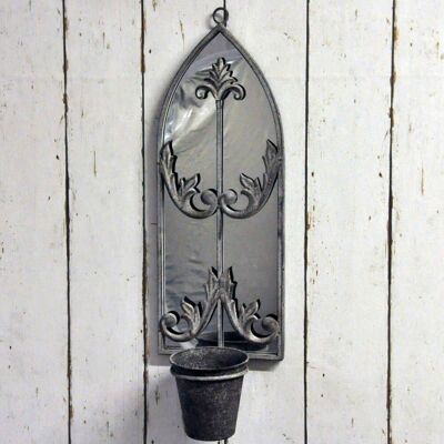 Specchio da parete in metallo arrugginito con fioriera