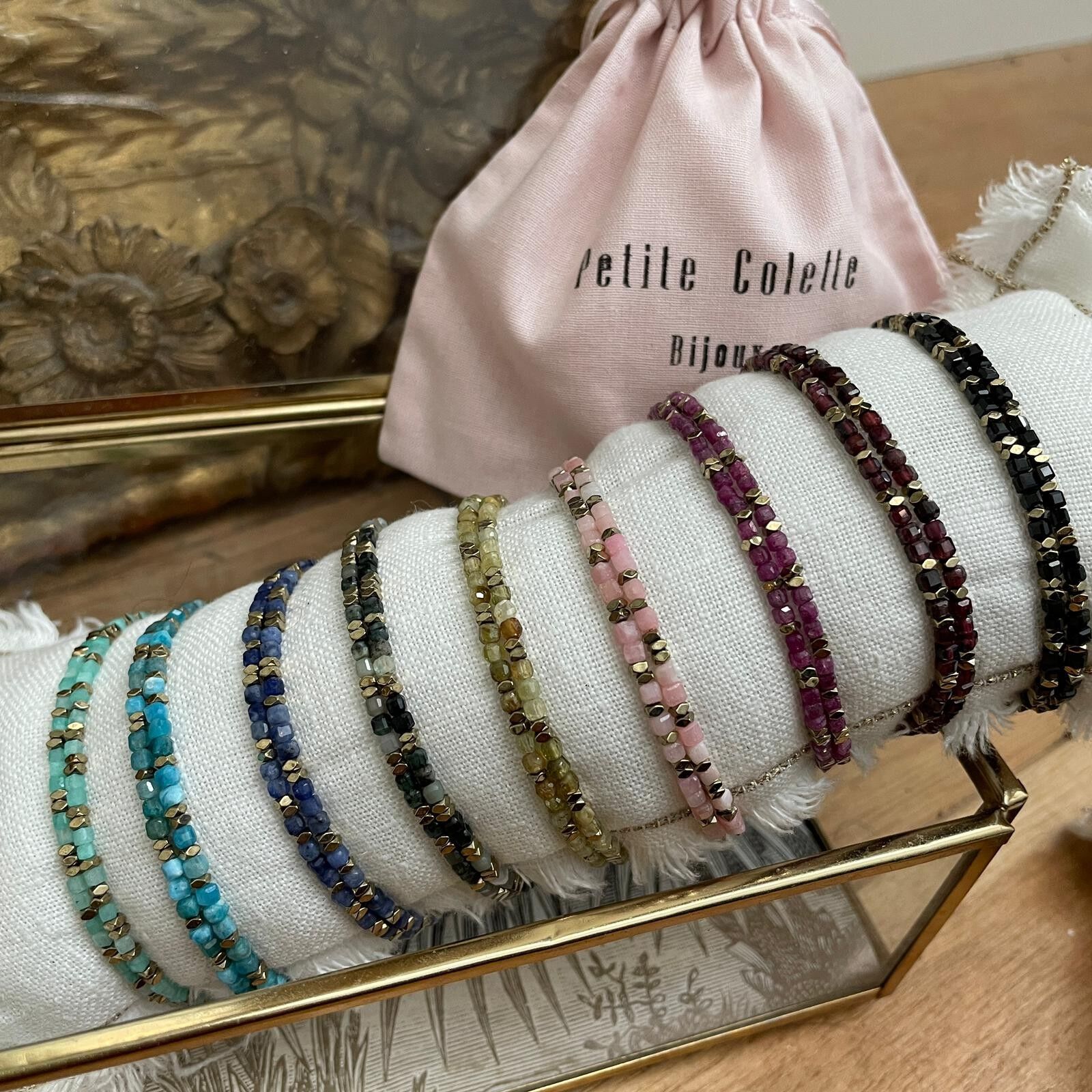 lotto 9 BRACCIALI Doppia torre romana - 9 pietre naturali