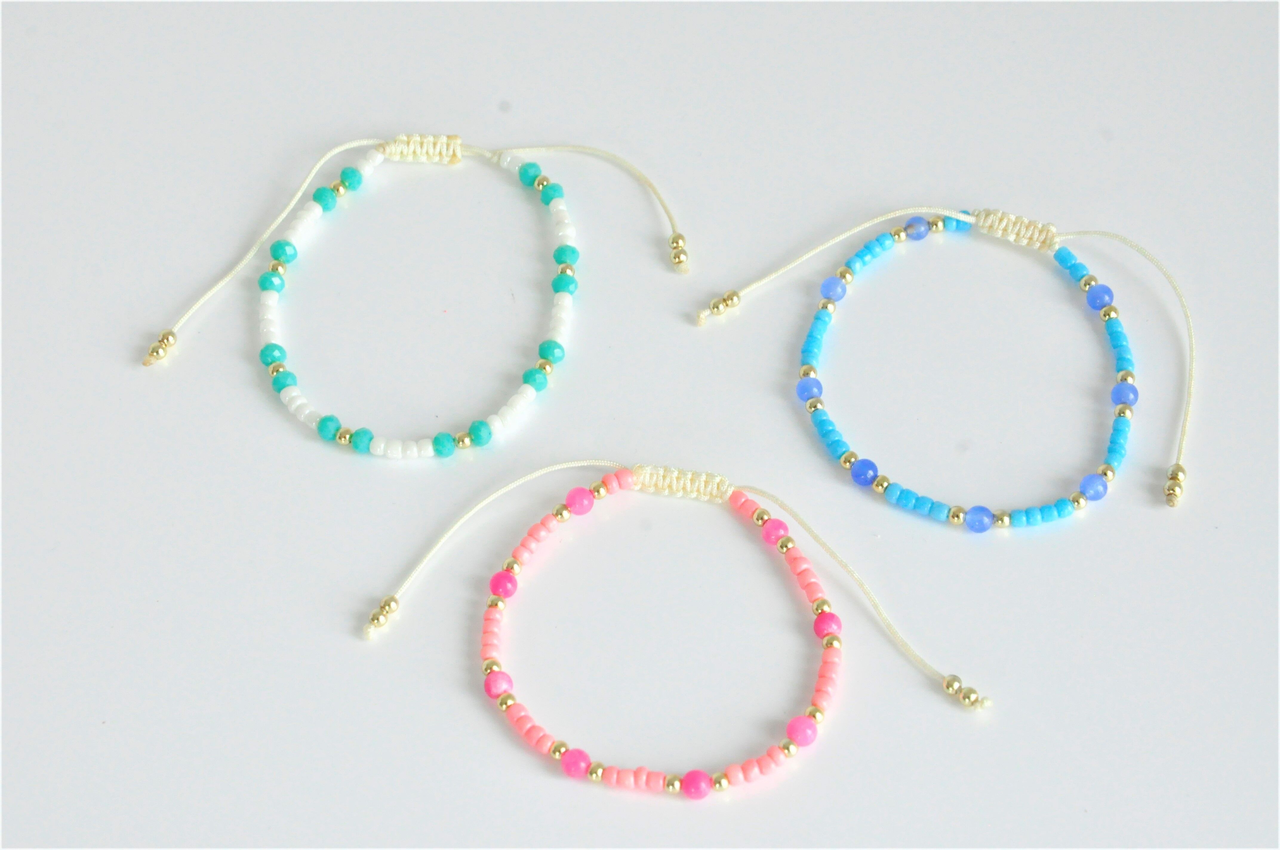 Bracciale piccole perle di vetro con oro