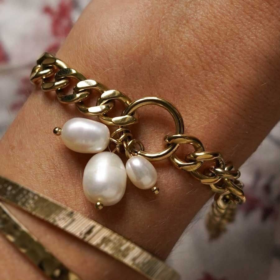 Bracciale cordolo in acciaio, anello e perla
