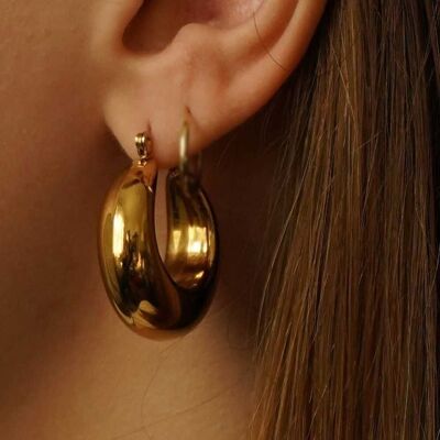 Large hornbill steel hoop earrings