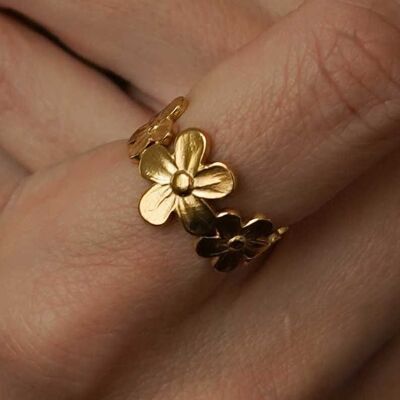 Bague large acier dore fleur