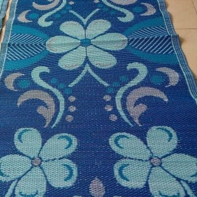 Alfombra plástica africana azul