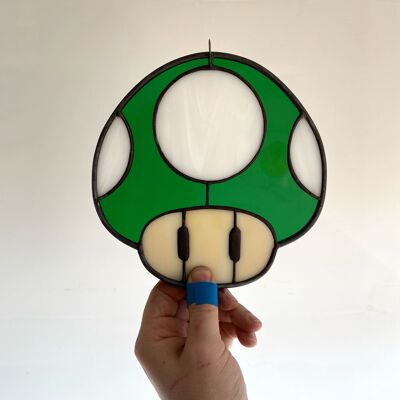 1 Up inspired stained glass piece