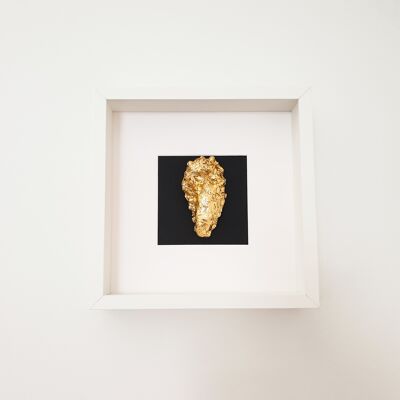 Golden oyster in white wooden frame