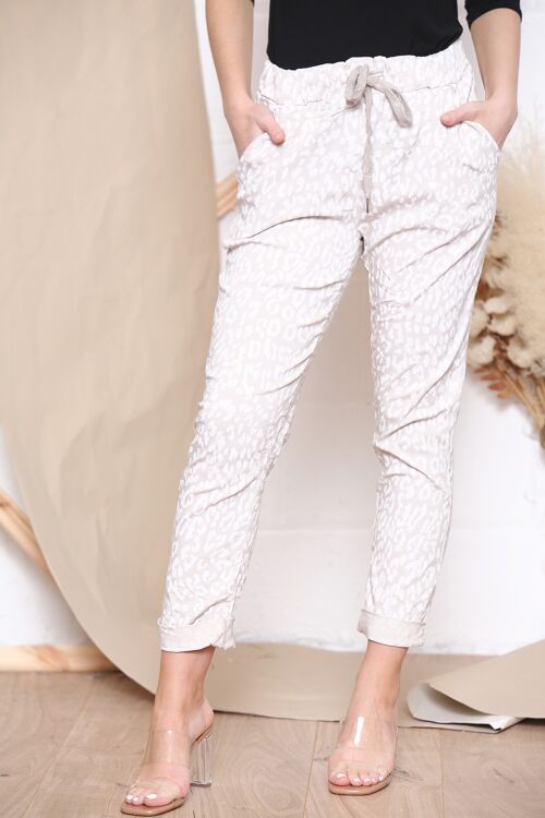 Beige leopard print high stretch trousers