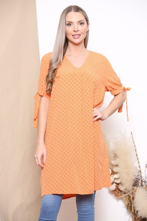 Orange patterned v neck dress with bow sleeves