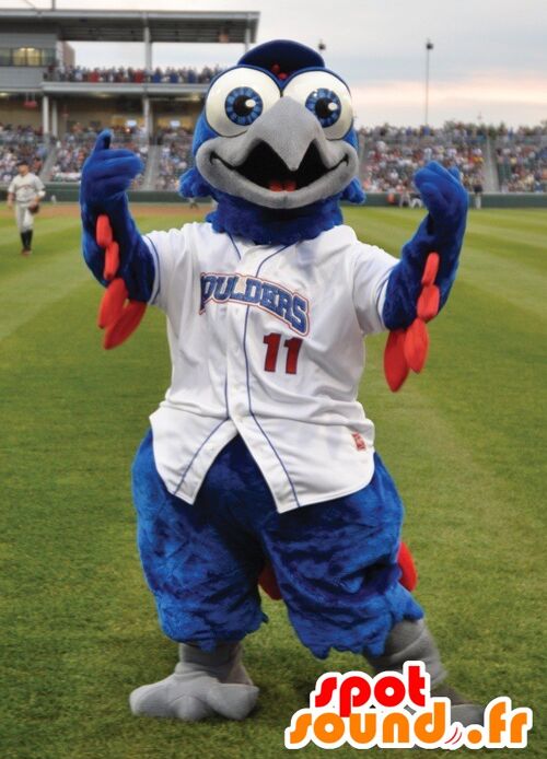 Costume de mascotte personnalisable d'oiseau bleu et rouge, en tenue blanche.