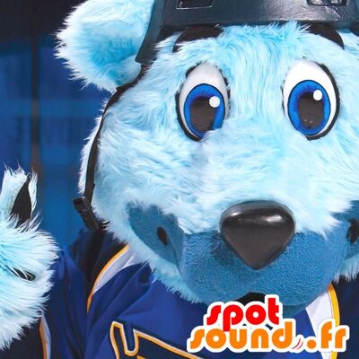 Costume de mascotte personnalisable d'ours bleu avec des yeux bleus, en tenue de sport.