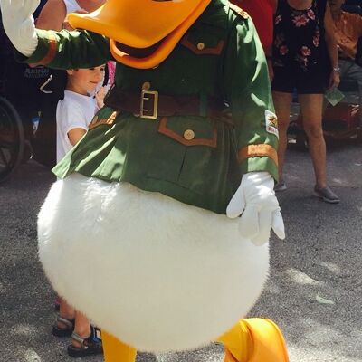 Costume de mascotte personnalisable de Donald Duck, habillé en explorateur.