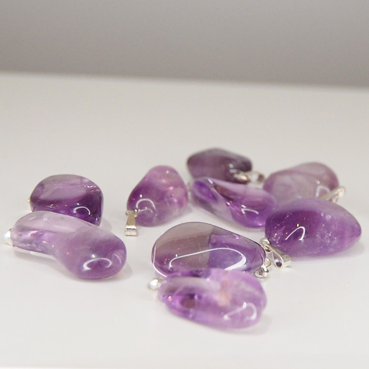 Brasilien-Amethyst-Anhänger Trommelstein der Güteklasse A - 1 Stück