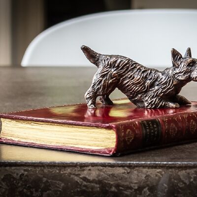 Scottie bending on Book Paperweight Bronzed RED