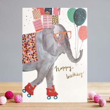 Éléphant d'anniversaire de patinage à roulettes