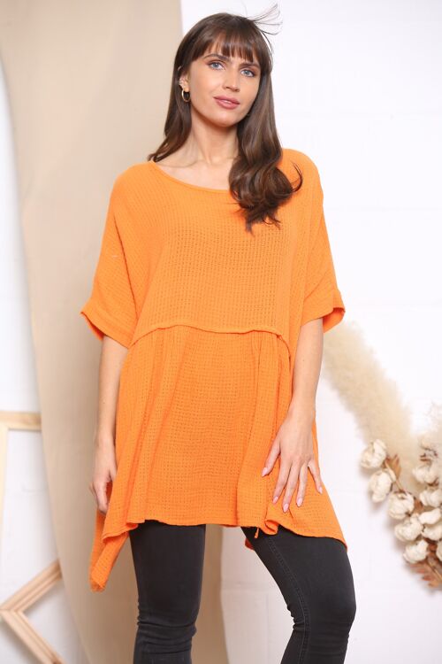 Orange waffle knit ruffled top