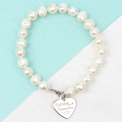 Bracelet personnalisé de perles d'eau douce blanches de première communion de tourbillons et de coeurs