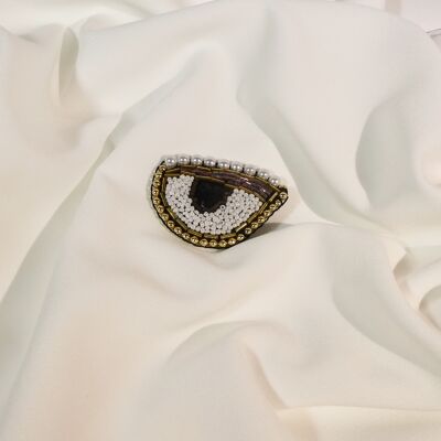 Eye brooch embroidered with pearls and sequins