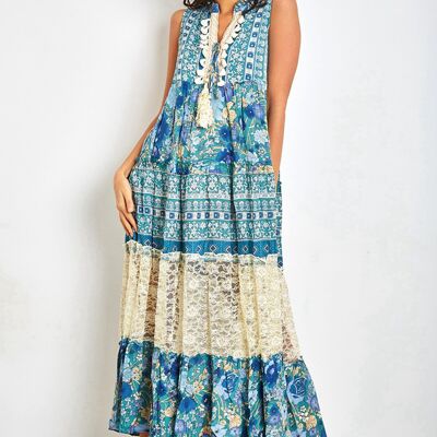 Long turquoise dress in bohemian print with pompoms and lace