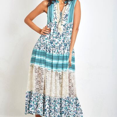 White long dress with bohemian print in blue flowers with pompoms and lace