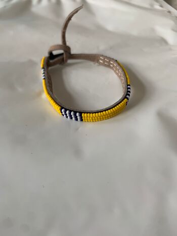 *nouveau* bracelet jaune avec blanc et noir