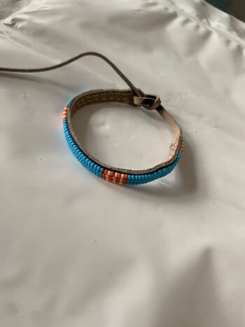 Bracelet bleu clair avec orange&blanc