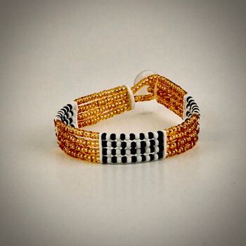 Bracelet Maasai avec bouton / or avec blanc/noir 1