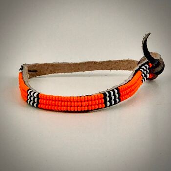 Bracelet orange avec blanc/noir 1