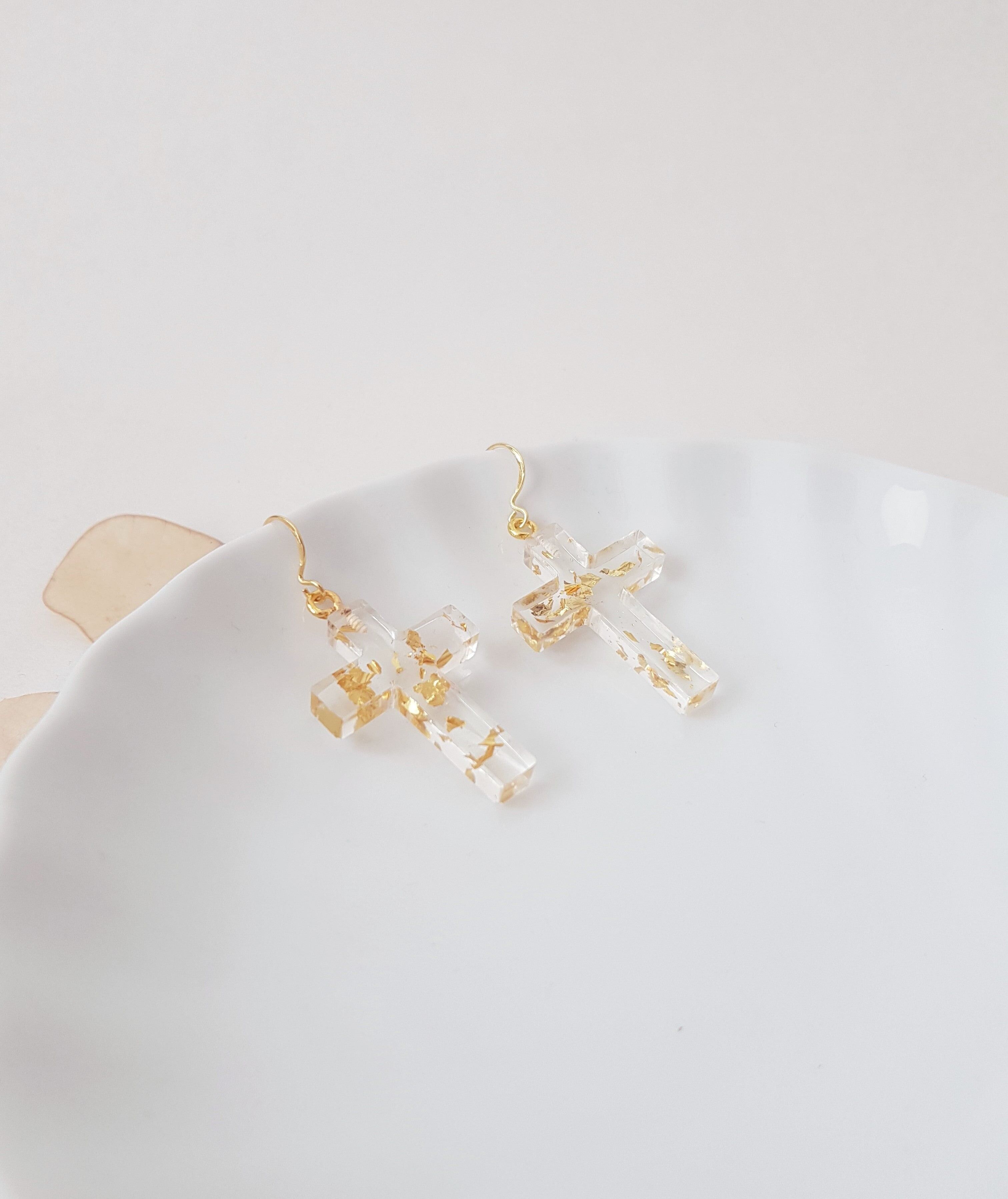 Kreuzohrringe trasparente con Blattgold