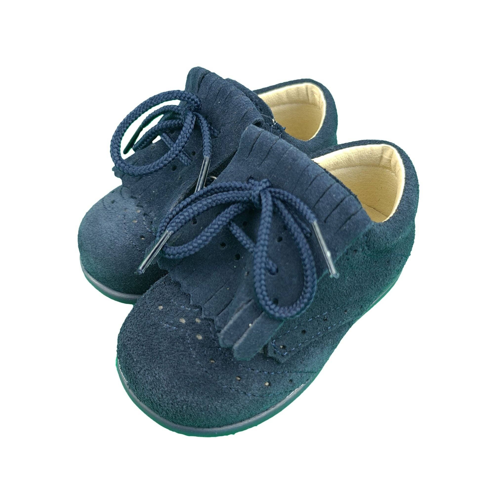 Zapatos de piel azul con cordones y suela flexible