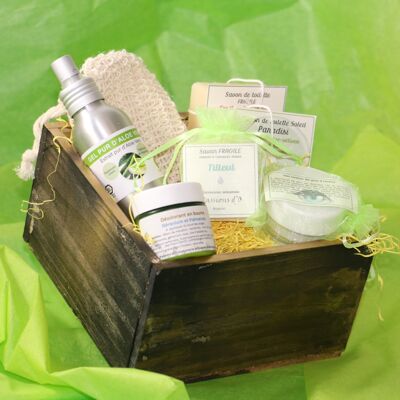 Aged wooden gift box containing natural cosmetics