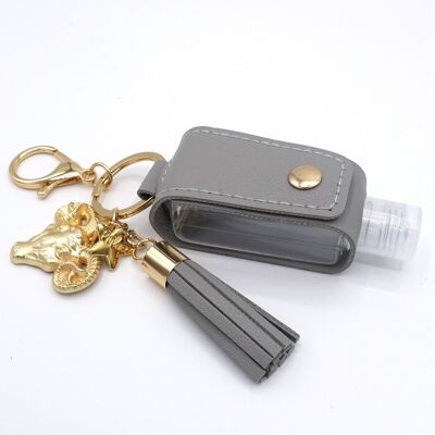 Gold and gray Aries gel key ring