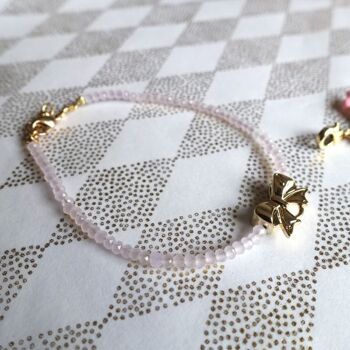 Bracelet Femme cristal rose pâle et noeud doré 1