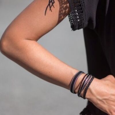 Women's black and silver magnetic cuff bracelet